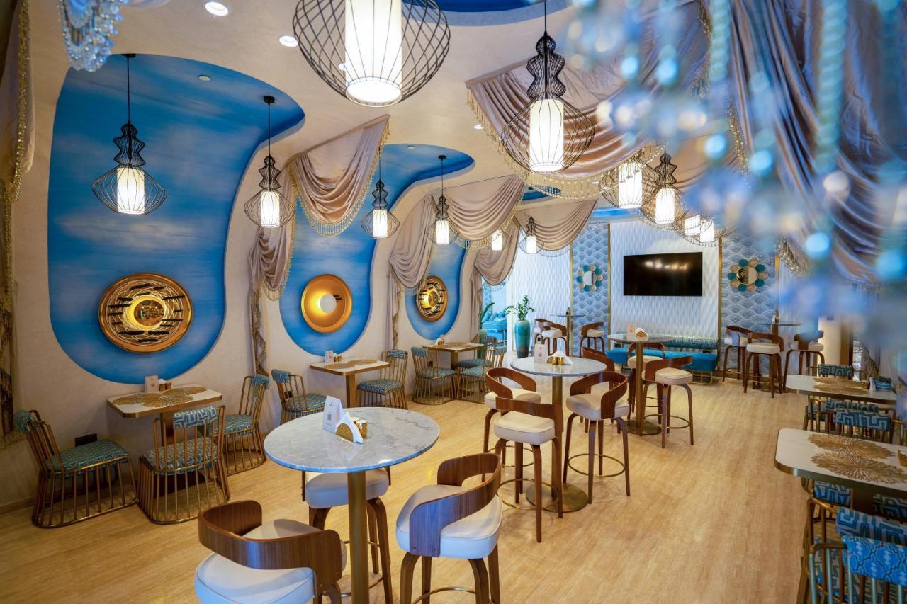 Velero Hotel Doha Lusail Exterior foto The interior of the restaurant