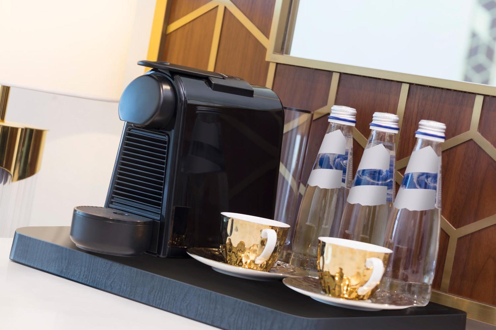Velero Hotel Doha Lusail Exterior foto A Nespresso coffee machine